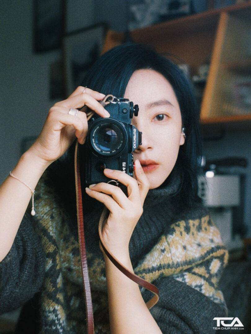 chụp ảnh với máy ảnh