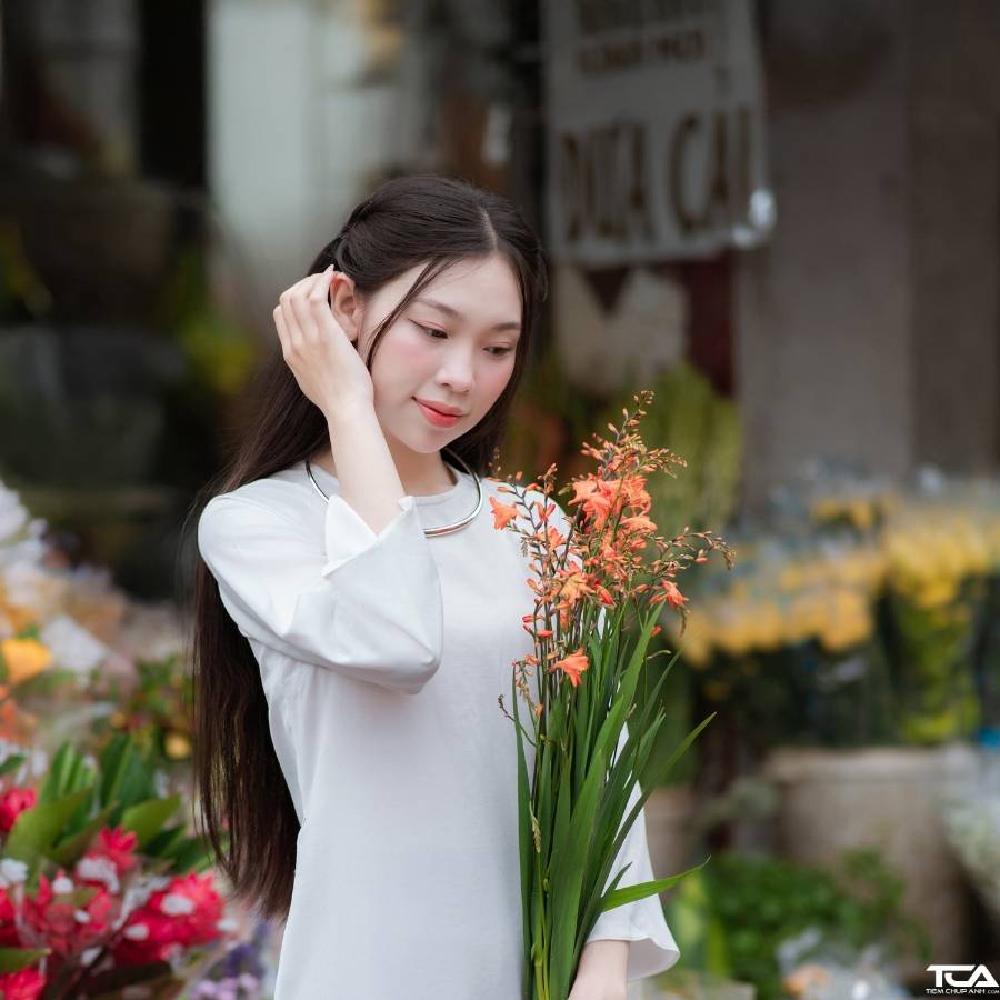 cách tạo dáng chụp áo dài tết